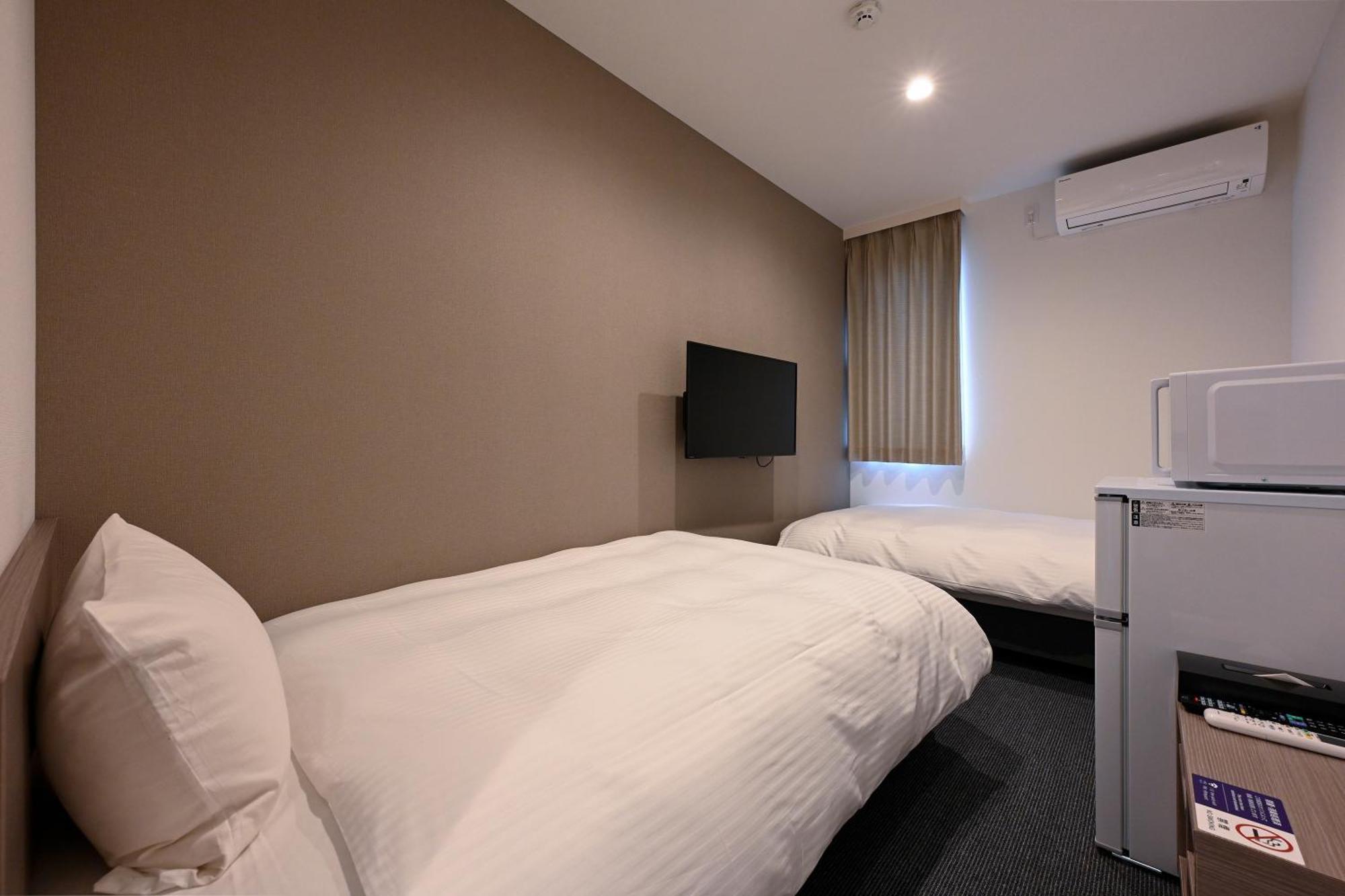 Hotel R9 The Yard Kohoku Saga Exteriör bild